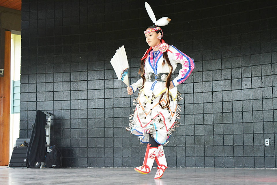 Larissa Munch performs a jingle dress dance, the dance of healing, during the Wild Women of the North Society’s Aug. 31 International Overdose Awareness Day event. Lindsay Chung photo