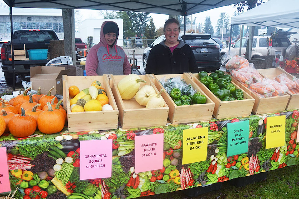 Ashley (left) and Gaynelle Barkman sell colourful fall produce from Cariboo Valley Farms Saturday, Oct. 12 at the Quesnel Farmers’ Market. Lindsay Chung photo