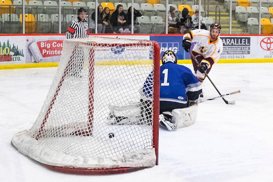 Quesnel Kangaroos Forward Paul Girodat (15) rings a shot off the post during a game against the league-leading Terrace River Kings Jan. 18 at the West Fraser Centre. The Roos would go on to win the game 8-3. (Sasha Sefter - Quesnel Cariboo Observer)