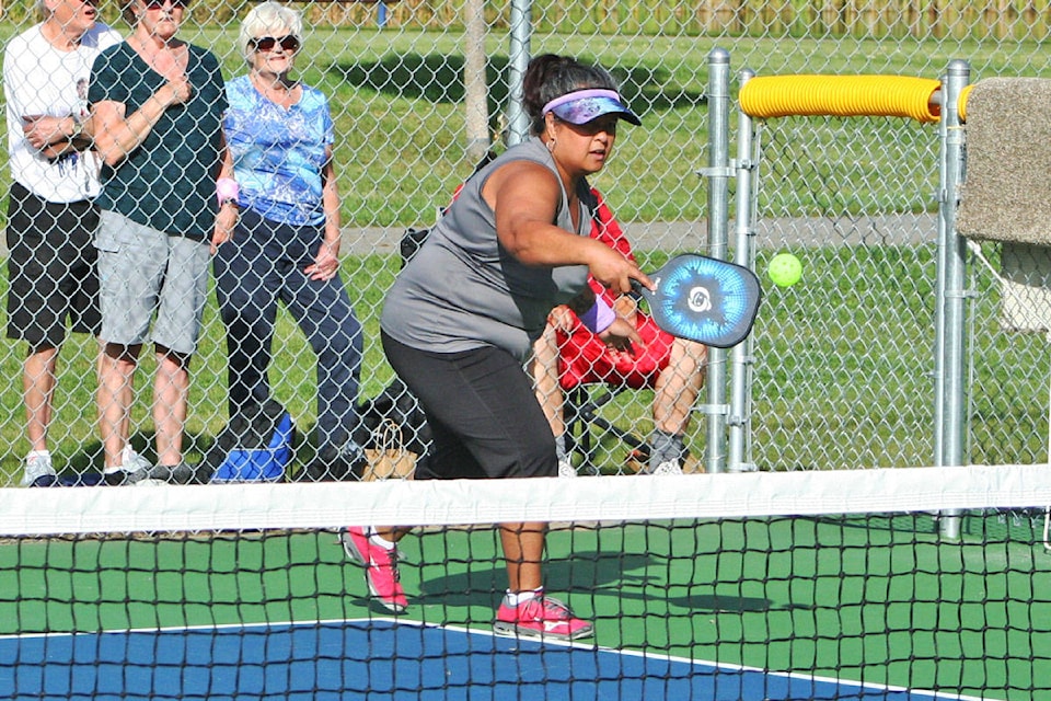 Jenny MacDonald returns a ball during the mixed doubles final at the Quesnel Pickleball Club tournament on Sept. 20. (Cassidy Dankochik Photo - Quesnel Cariboo Observer)