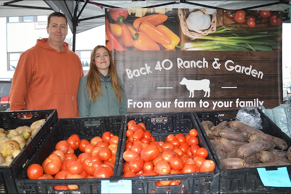 Shane Stobbe and Mariah Kampman sell produce from Back 40 Ranch and Garden Saturday, Sept. 26 at the Quesnel Farmers’ Market. There are three more Saturday markets this fall, and the Quesnel Farmers’ Market has announced there will be no indoor Christmas Markets this year. (Lindsay Chung Photo - Quesnel Cariboo Observer)
