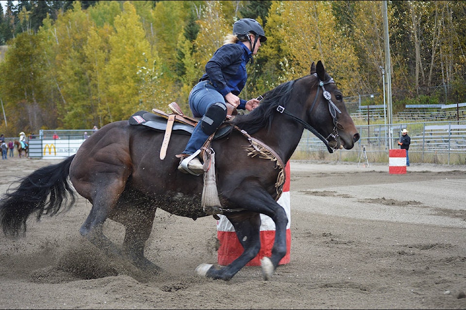 Chelsea Brears and Gus round the third barrel in open barrel racing Sunday, Sept. 27 at the Gold City Showdown Open Timed Event Rodeo at Alex Fraser Park. (Lindsay Chung Photo - Quesnel Cariboo Observer)