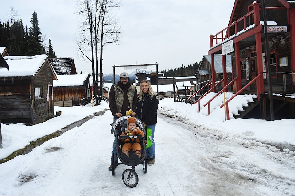 Mikaela and Craig Shelley brought 18-month-old Jake through Barkerville Historic Town and Park for the traditional Halloween trick or treat event Oct. 31. (Lindsay Chung Photo - Quesnel Cariboo Observer)