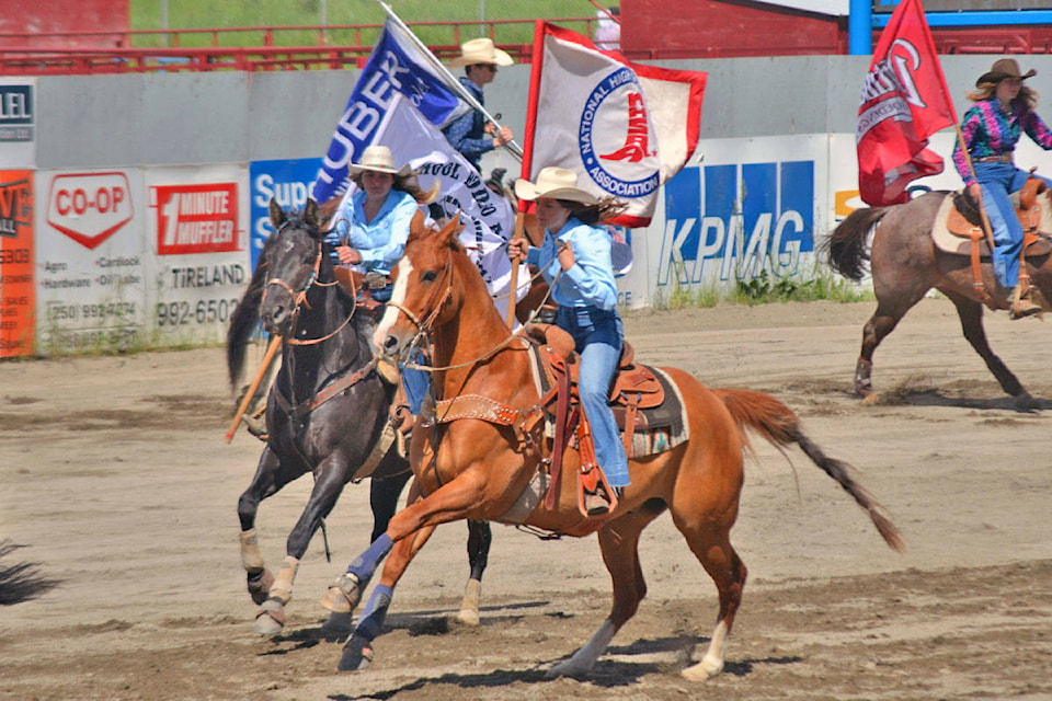 Julia Bowden carries the National High School Rodeo Association flag into the Gus Cameron Arena to start Saturday’s events at the Provincial Senior High School Rodeo Finals. Bowden was the only competitor to represent Quesnel at the event, which included top competitors in events from across the province. (Cassidy Dankochik Photo - Quesnel Cariboo Observer)