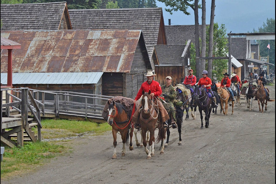 Canadian Ranger Sergeant Paul Nichols, Patrol Commander of the Quesnel Canadian Ranger Patrol (CRP), and Canadian Ranger Instructor Warrant Officer Kirk McColl lead the Quesnel CRP through Barkerville Historic Town and Park on Saturday, July 17. (Lindsay Chung/4th Canadian Ranger Patrol Group Facebook)