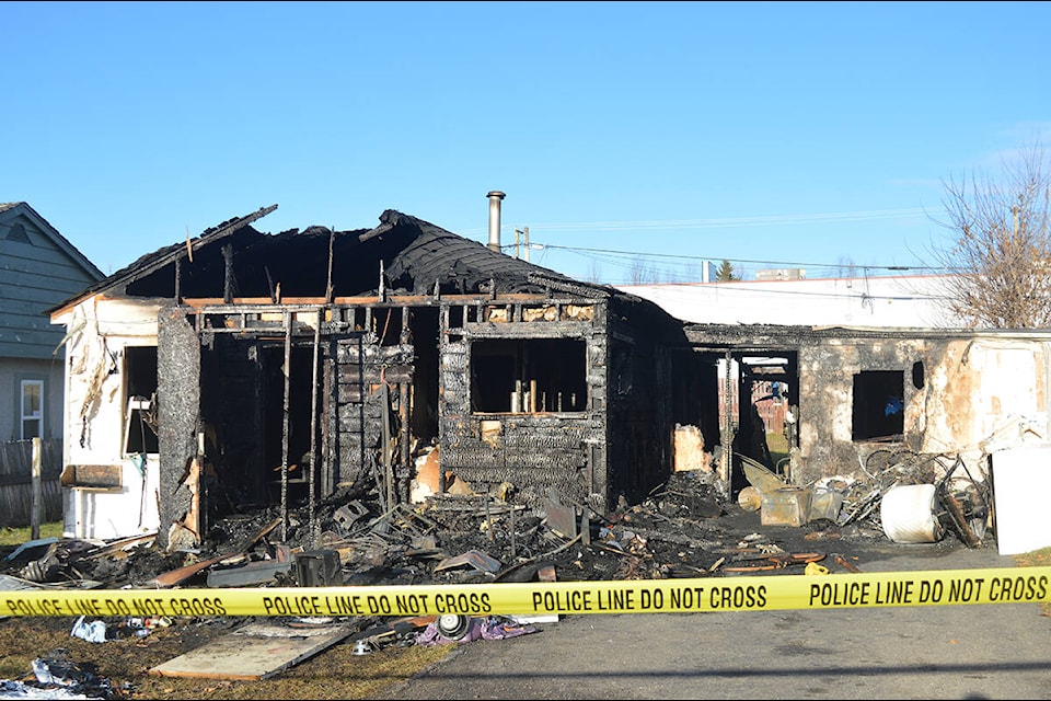 A home on Willis Street was destroyed after a fire broke out Tuesday, Nov. 9. Quesnel RCMP said a female suspect has been arrested in relation to the incident. (Rebecca Dyok photo)
