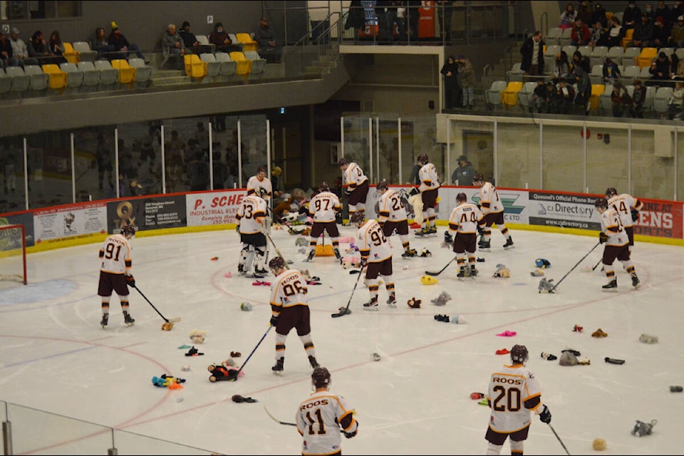 The Quesnel Kangaroos cleared the ice of stuffed animals, toques and mittens after their early first-period goal against the Williams Lake Stampeders. “It was great to see the community step up and be able to do that for people around that need it,” said head coach Harley Gilks. (Rebecca Dyok photo)