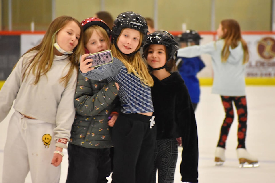 Friends Ellie, Kelsey, Trinity, and Myckayla pause from skating for a selfie at the Boots and Toques Festival on Friday, Feb. 25. (Rebecca Dyok photo - Quesnel Cariboo Observer)