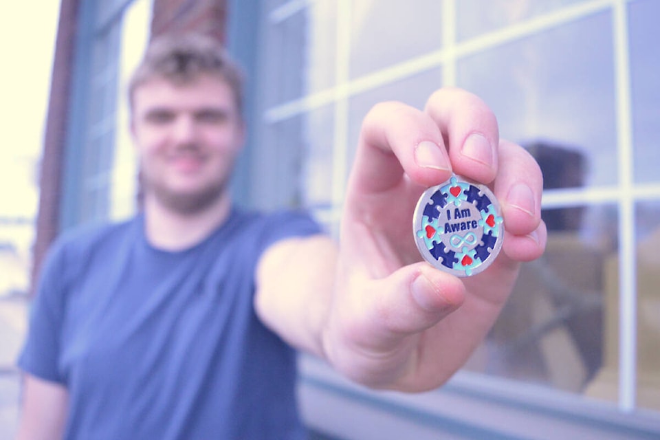 The 2022 pin design incorporates both an infinity symbol and puzzle pieces, which have both been used as a symbol for autism awareness. (Cassidy Dankochik Photo - Quesnel Cariboo Observer)