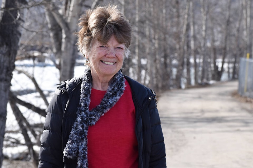 Gloria Weber spent her Monday afternoon walking the Riverfront Trail in Quesnel. She, like many others, had been eagerly waiting for it to reopen. (Rebecca Dyok photo — Quesnel Cariboo Observer)