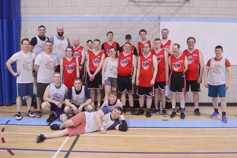 Members, friends and family of the Quesnel RCMP came together to play a game of basketball against the Special Olympics team. (Cassidy Dankochik Photo - Quesnel Cariboo Observer)