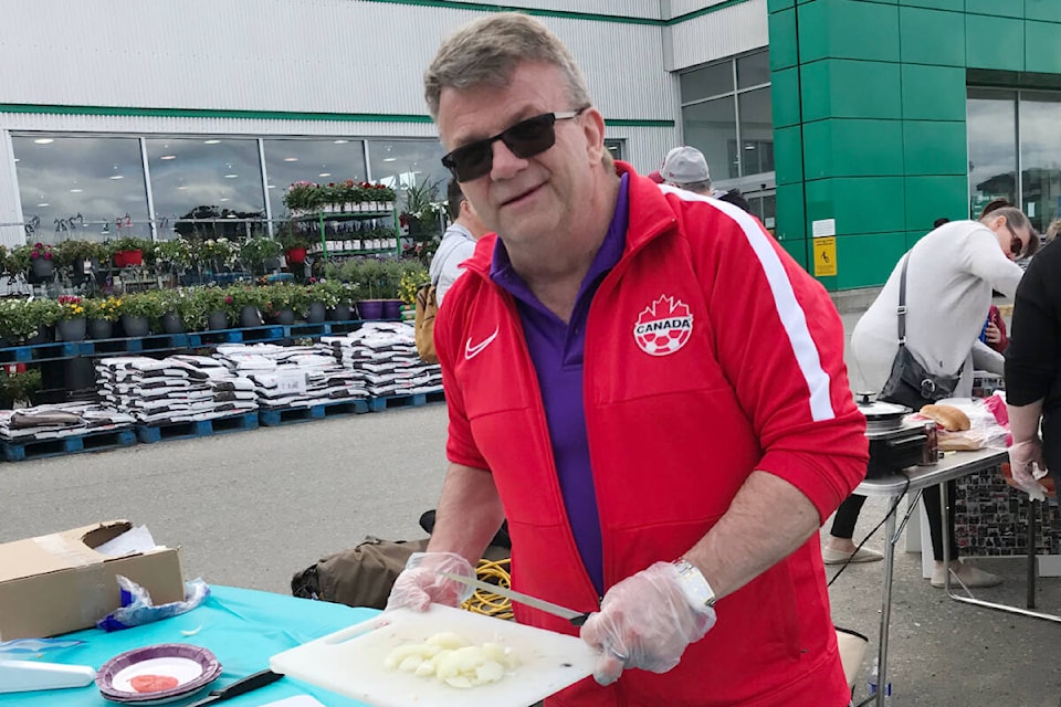 Rick Prosk was among the coaches helping Quesnel Special Olympics athletes with a spring fling fundraiser. (Photo submitted)