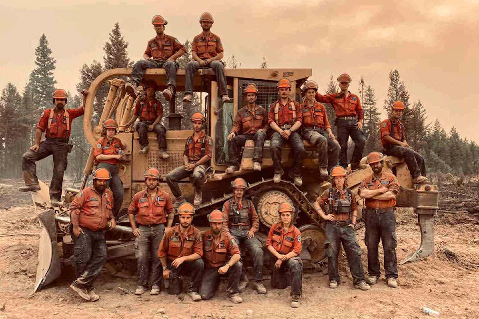 Members of the Blackwater unit crew with equipment on a past fire. The Blackwater unit crew is based in Quesnel but will respond to fires throughout the province. (Contributed photo)