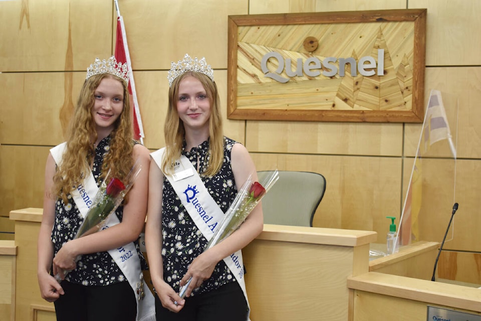2022 Quesnel ambassadors Nevaeh Kueber (left) and Jada Crossman were introduced to city council on Tuesday, Aug. 16. They both received a rose and are waiting to receive a city jacket which mayor Bob Simpson said is on order. (Rebecca Dyok photo — Quesnel Observer)