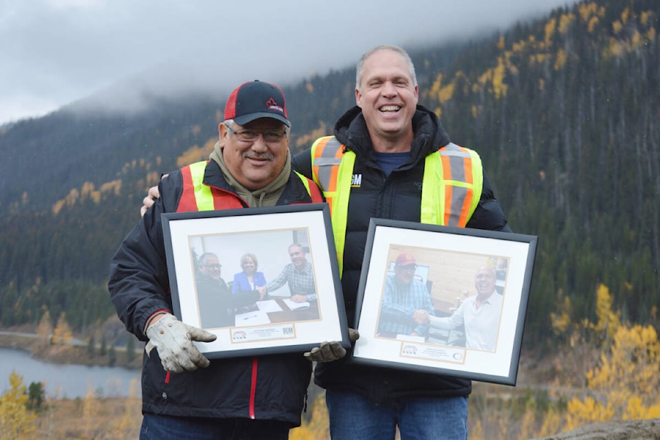 Lhtako Dene Nation Chief Clifford Lebrun (left) with Osisko Development vice president of sustainable development Chris Pharness attend a celebration in Wells Oct. 22 to highlight an agreement with the mining company and Indigenous community. (Rebecca Dyok photo — Quesnel Observer)