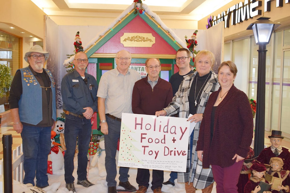 31061069_web1_221123-QCO-West-Park-Mall-Food-Toy-Drive-West-Park-Mall-Holiday-Food-and-Toy-Drive_1