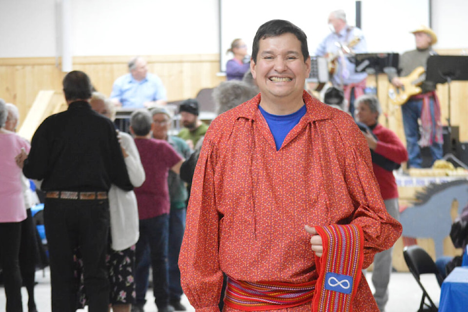 Quesnel Tillicum Society executive director Tony Goulet was wearing a Métis sash at the Friendship Centre that marked Louis Riel Day on Nov. 19. (Rebecca Dyok photo — Quesnel Observer)