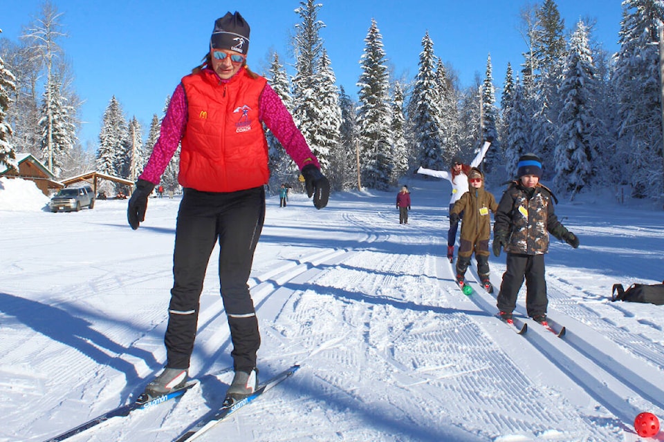 Coach Laurie Bare leads new skiers around the Hallis Lake trails, as did many Cariboo Ski Touring Club volunteers on Sunday, Jan. 23 to take advantage of the fresh snow and sunshine at Ski-Fest. (James Meyer photo)