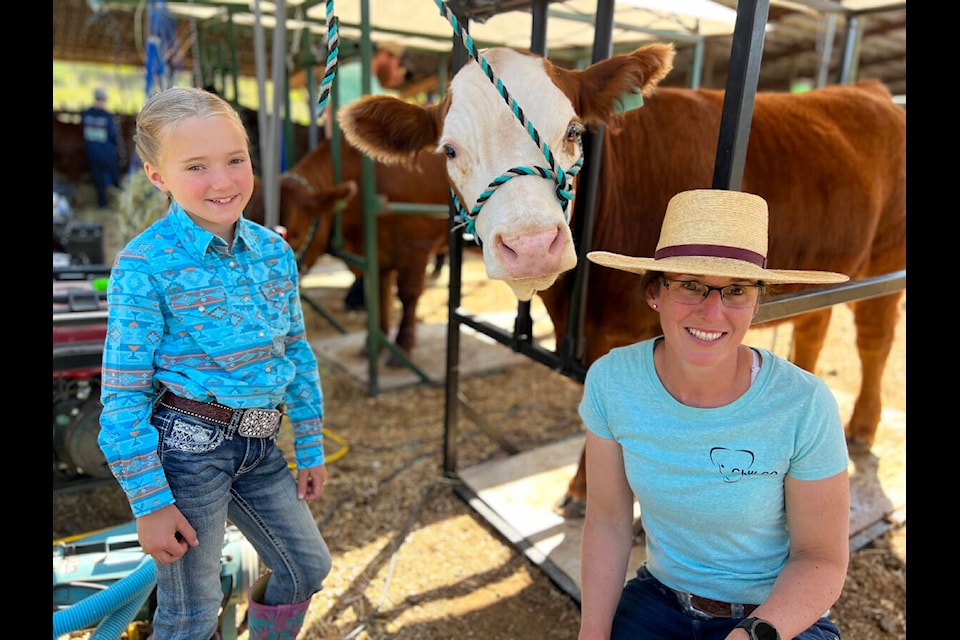 Taylor Grier of Hanceville, B.C. prepares to show her animal with the help of her family, including mom Crystal, at the 2nd Annual Cariboo Classic Junior Steer & Heifer Show. The event showcased the efforts of more than 150 youth who travelled from across the province to take in the Williams Lake show. See page 15 for more. (Angie Mindus photo - Williams Lake Tribune)