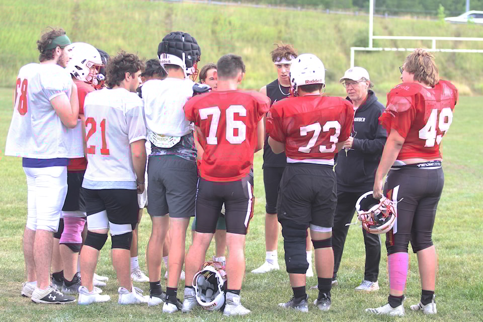 Lindsay Thurber Raiders senior football team head coach Ole Stearns talks to his Grade 12 players at practice ahead of their first game of the Central Alberta High School Football League season on Thursday, Sept. 5 against the Lacombe Rams.