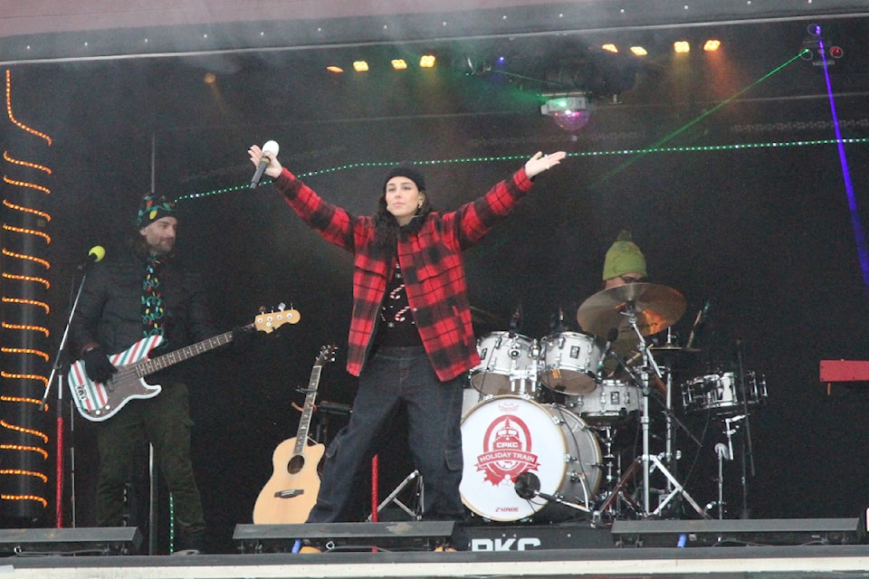 Portuguese-Canadian singer, songwriter and multi-instrumentalist Sofia Camara entertained as the CPKC Holiday Train stopped in Blackfalds on Wednesday afternoon. (Photo by Paul Cowley/Advocate staff)