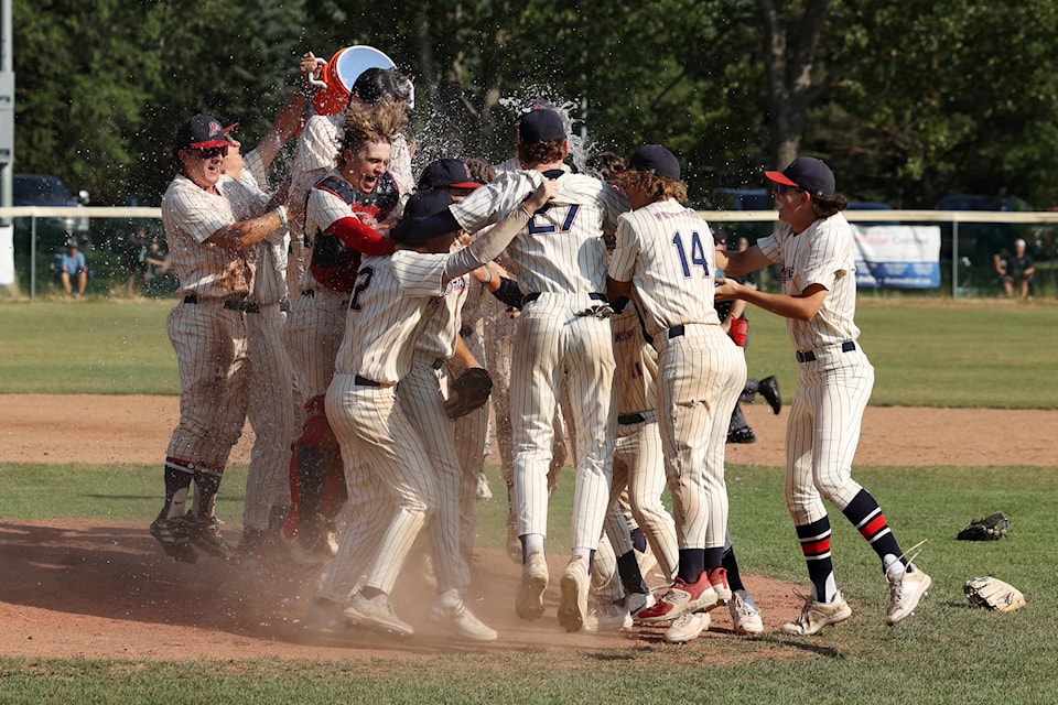 The Red Deer CarStar Braves celebrate after they defeated the host St. Albert Cardinals 17-5 in the BAEL provincial final on Sunday in St. Albert.