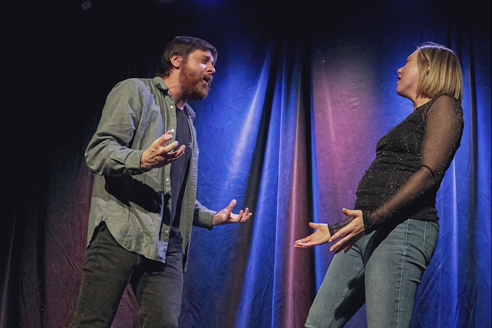 Jenna Goldade and Arick Yasinski share a moment on the Bull Skit Comedy stage. (Photo contributed)