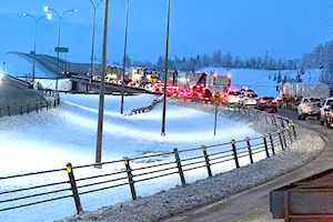 Wet, heavy snow pummels parts of Central Alberta