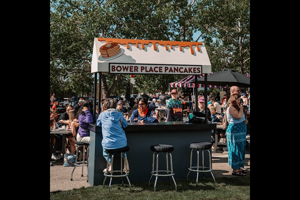 Hundreds of Red Deerians lined up in the Bower Place parking lot for the celebratory Pancake Breakfast on Sunday. 
