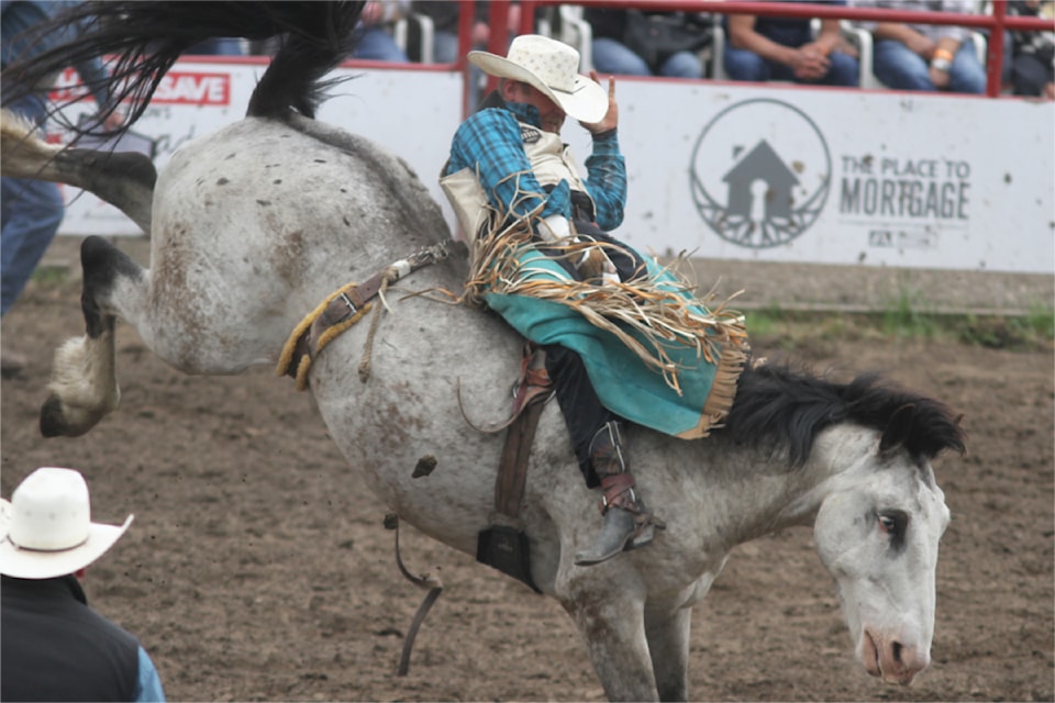 Timothy Murphy competes in the bareback riding event at the Daines Ranch Pro Rodeo, which was held from Friday, June 13 to Sunday, June 15. (Photo by Sean McIntosh/Advocate staff)