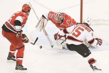 Cam Ward, Tim Gleason, Jamie Langenbrunner