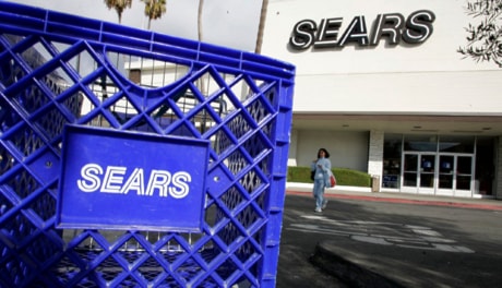 Earns Sears Holdings