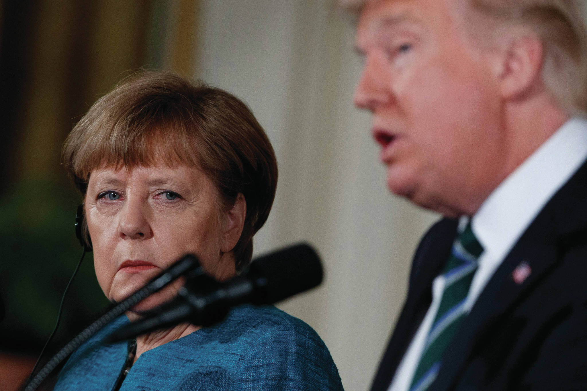 web1_170318-RDA-World-Trump-Merkel-PIC
