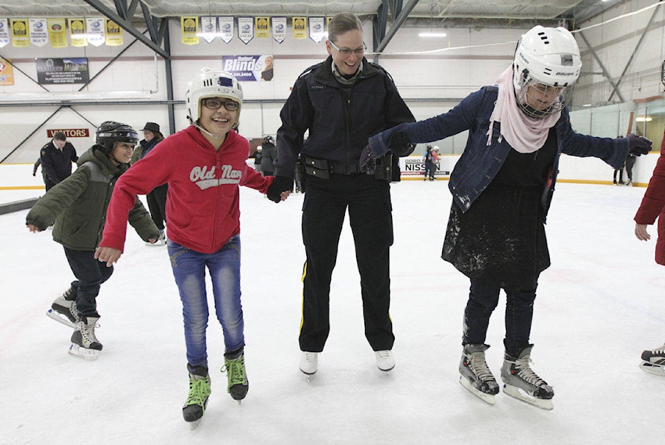 10008845_web1_161228-RDA-refugee-Skating-lessons