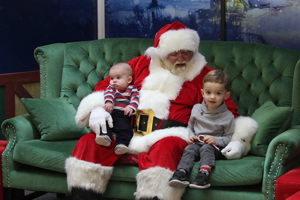 Red Deer’s Leo Ferreira and his little brother Beck got to meet Santa at Bower Place mall on Friday. Photo by PAUL COWLEY/Advocate staff