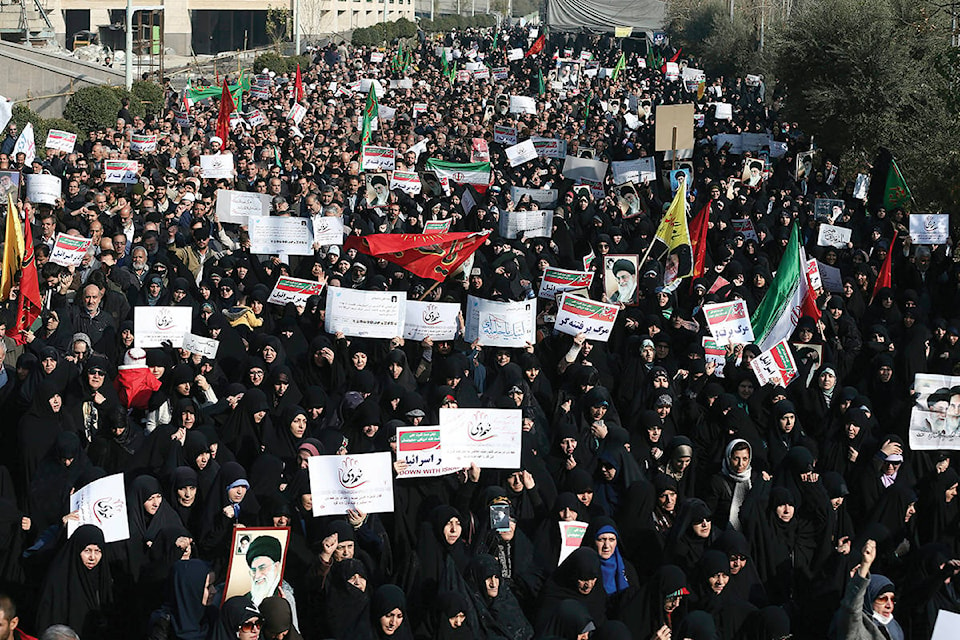 10033872_web1_180103-RDA-Iran-protests-for-web