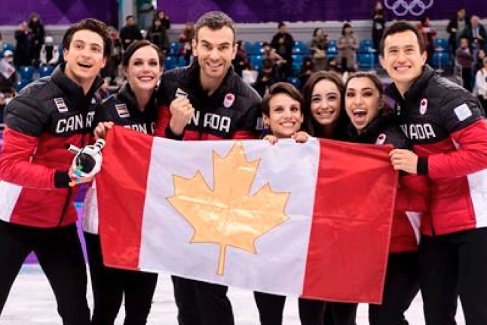 10579681_web1_180212-RDA-Figure-skating-team-Kingsbury-claim-Canadas-first-gold-medals-of-Games_1