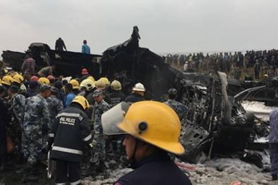 10964823_web1_180312-RDA-Plane-carrying-71-people-crashes-catches-fire-in-Kathmandu_1