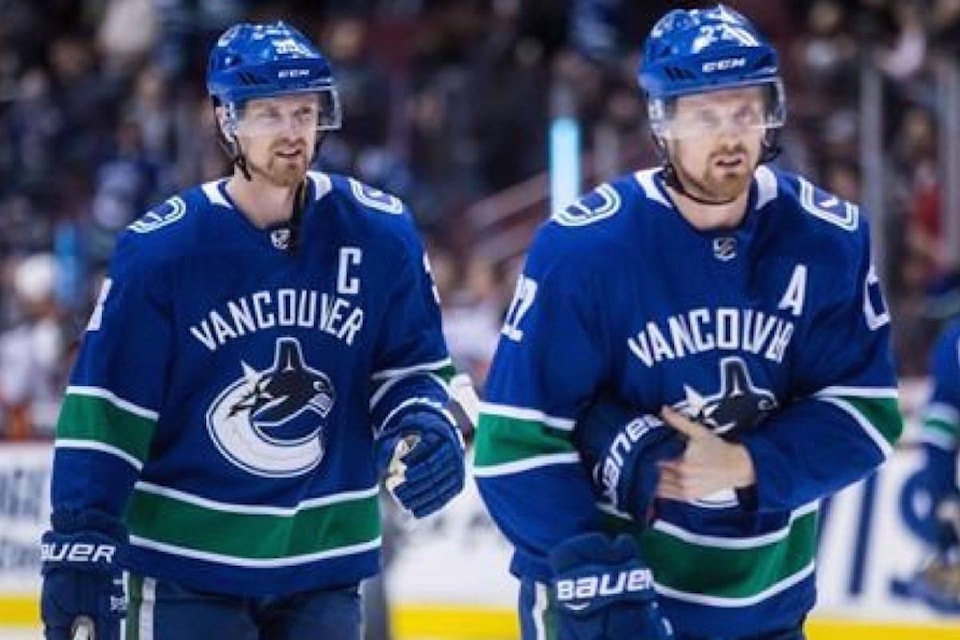 11278069_web1_180403-RDA-Canucks-stars-Henrik-and-Daniel-Sedin-say-they-will-retire-after-the-season_1