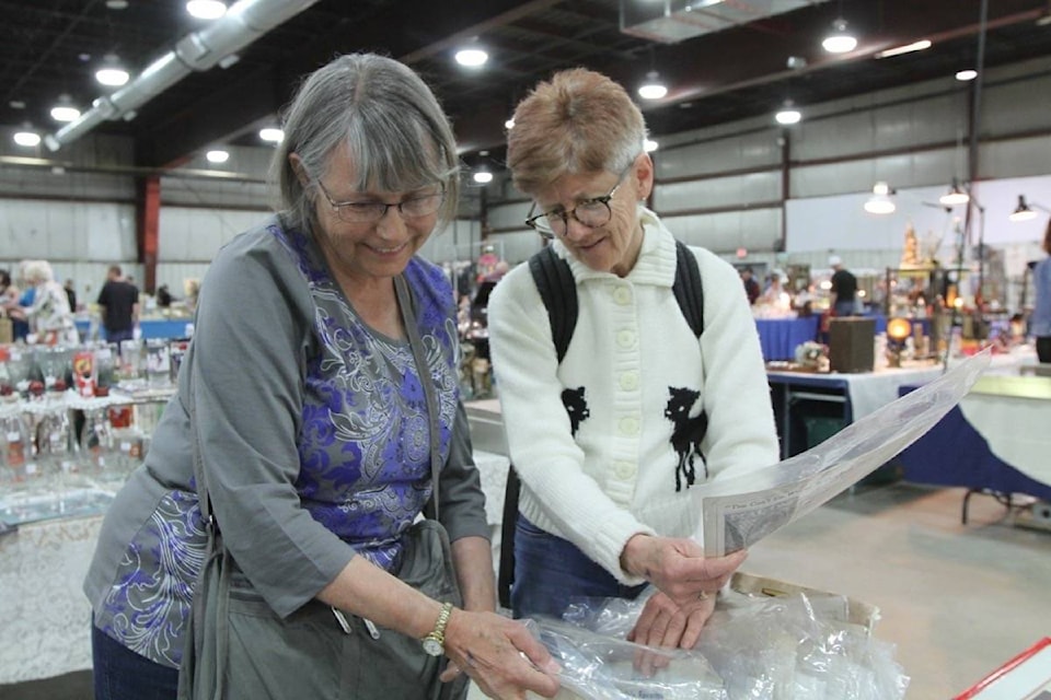 Roberta Ryckman and Kate Reeves came from Calgary to take in the Antique, Vintage and Retro Show and Sale Saturday at Westerner Park. The event runs Saturday and Sunday at the Stockmens Pavilion. (Photo by SEAN MCINTOSH/Advocate staff)