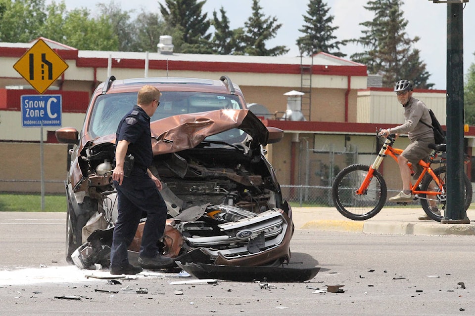 The driver of this vehicle suffered only minor injuries after colliding with another vehicle driven by a suspect who had fled from police. Photo by PAUL COWLE/Advocate staff