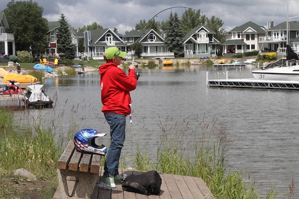 Matthew Fraser fishes regularly at Marina Bay where the fish are usually biting. Unfortunately, this one got away but there were plenty more waiting to be caught. Photo by PAUL COWLEY/Advocate staff