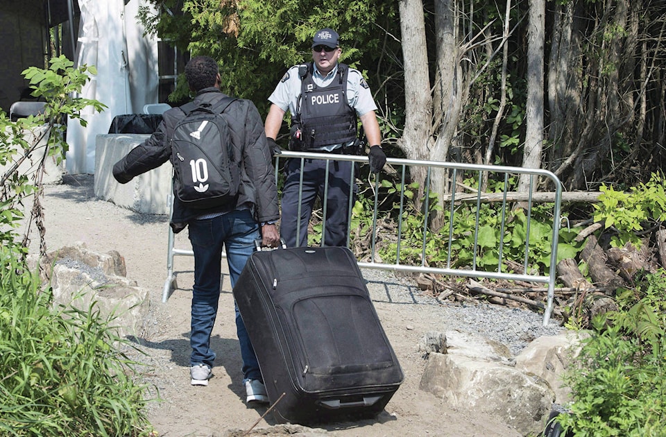 12848621_web1_180724-RDA-Canada-Immigration-Detention-Reform-PIC