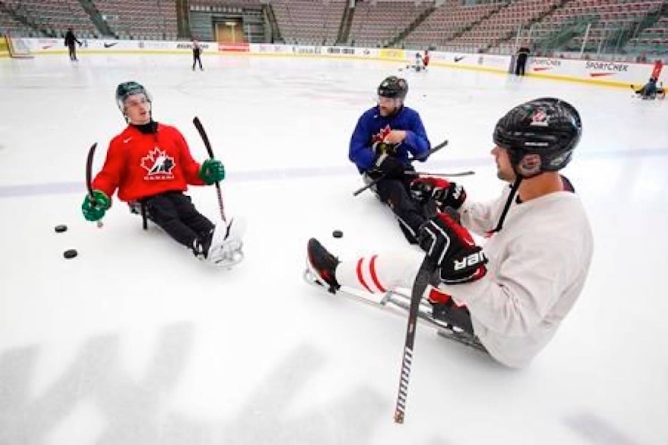 13054919_web1_180808-RDA-Ill-get-better-Paralyzed-Broncos-player-working-to-improve-at-sledge-hockey_1
