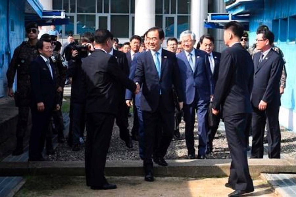 13107599_web1_180813-RDA-Rival-Korea-leaders-to-meet-in-Pyongyang-in-September_1