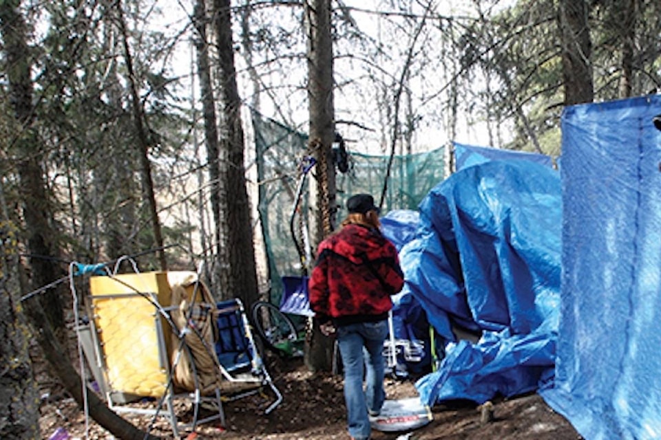 14301132_web1_181107-RDA-M-homeless-camp-cropped