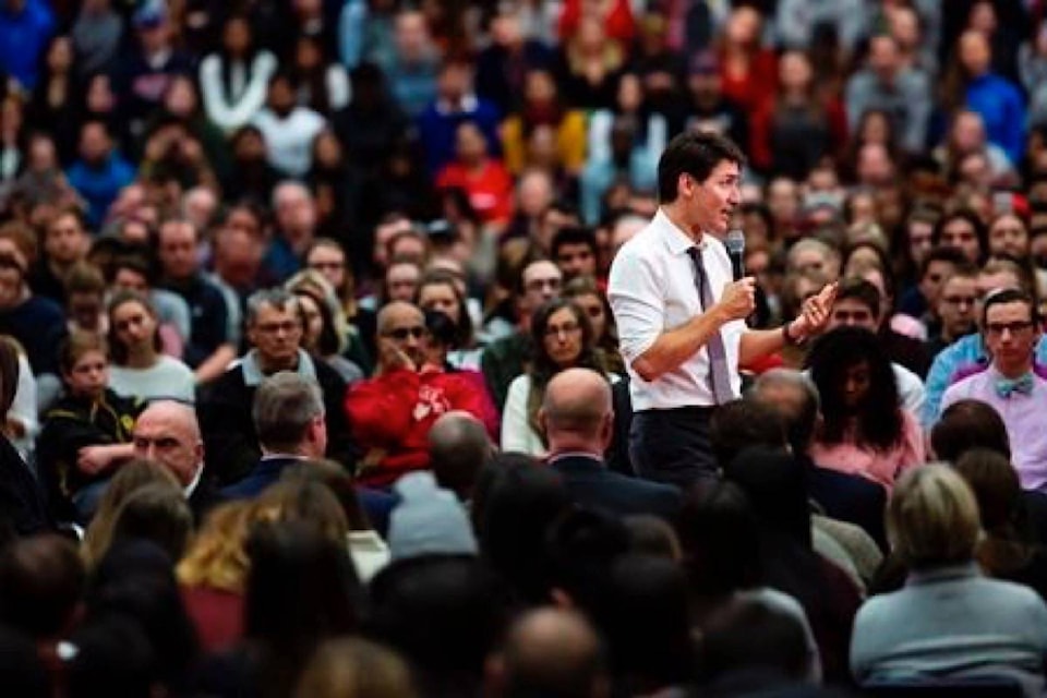 15158038_web1_190116-RDA-Trudeau-fields-range-of-questions-on-immigration-and-foreign-policy-at-townhall_1