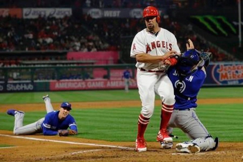 16677738_web1_190503-RDA-Trout-Calhoun-homer-in-Angels-6-2-win-over-Jays-for-sweep_1