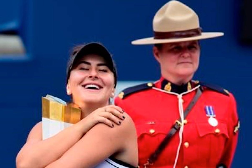 18068393_web1_190812-RDA-Canadas-Andreescu-wins-Rogers-Cup-after-Williams-retires-due-to-injury_1