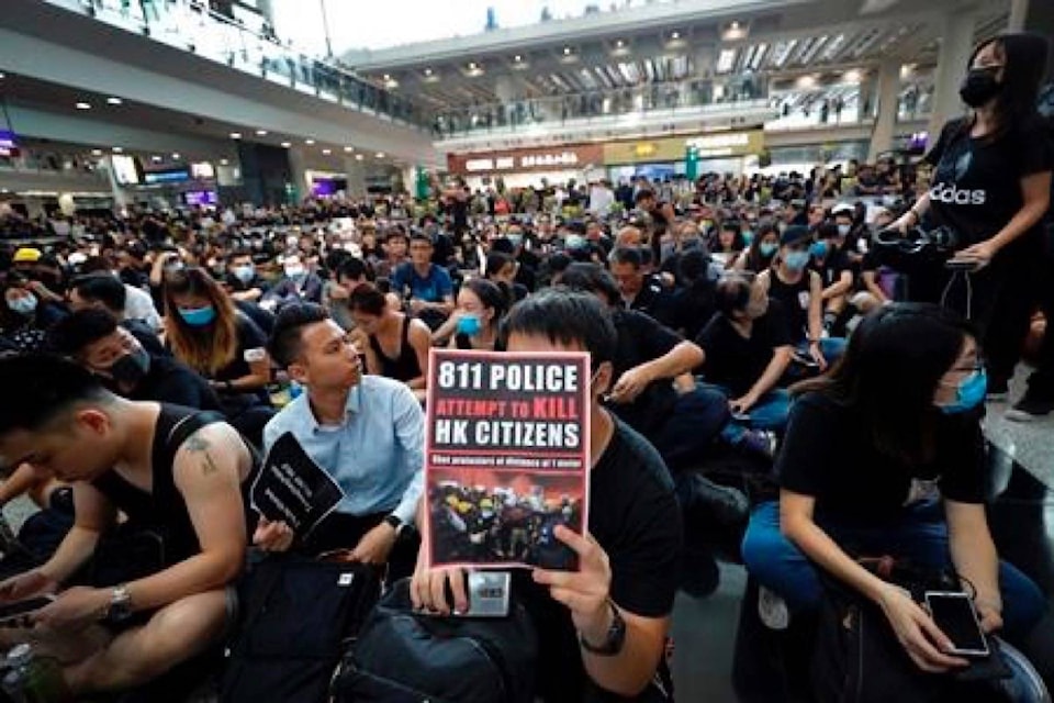 18085893_web1_190813-RDA-Flights-out-of-Hong-Kong-cancelled-again-amid-protests_1